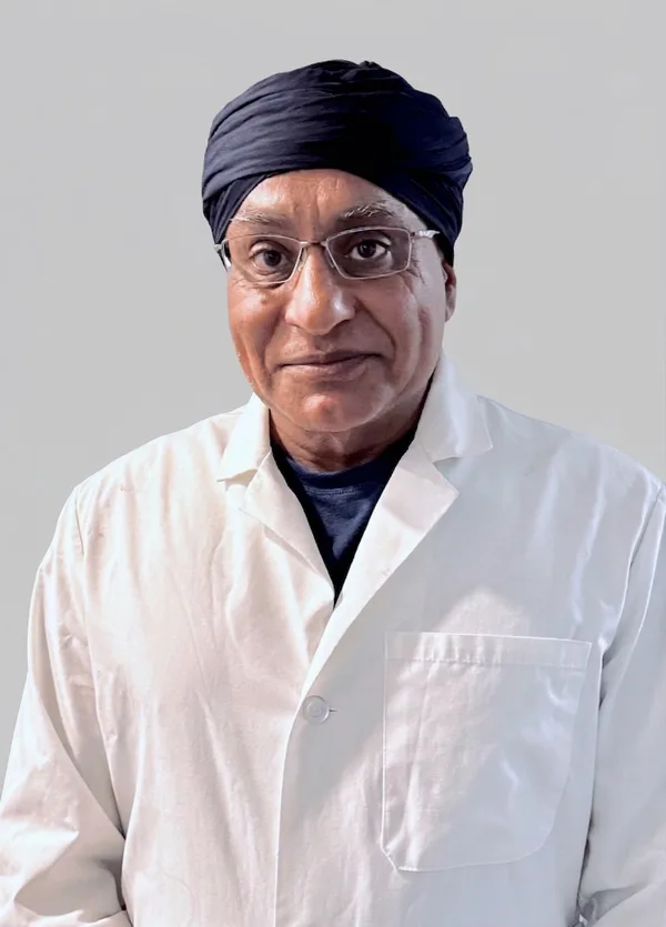 Dr. Gurpreet Singh Padda, MD, MBA, MHP, medical director of Measura in St. Louis, wearing a white coat